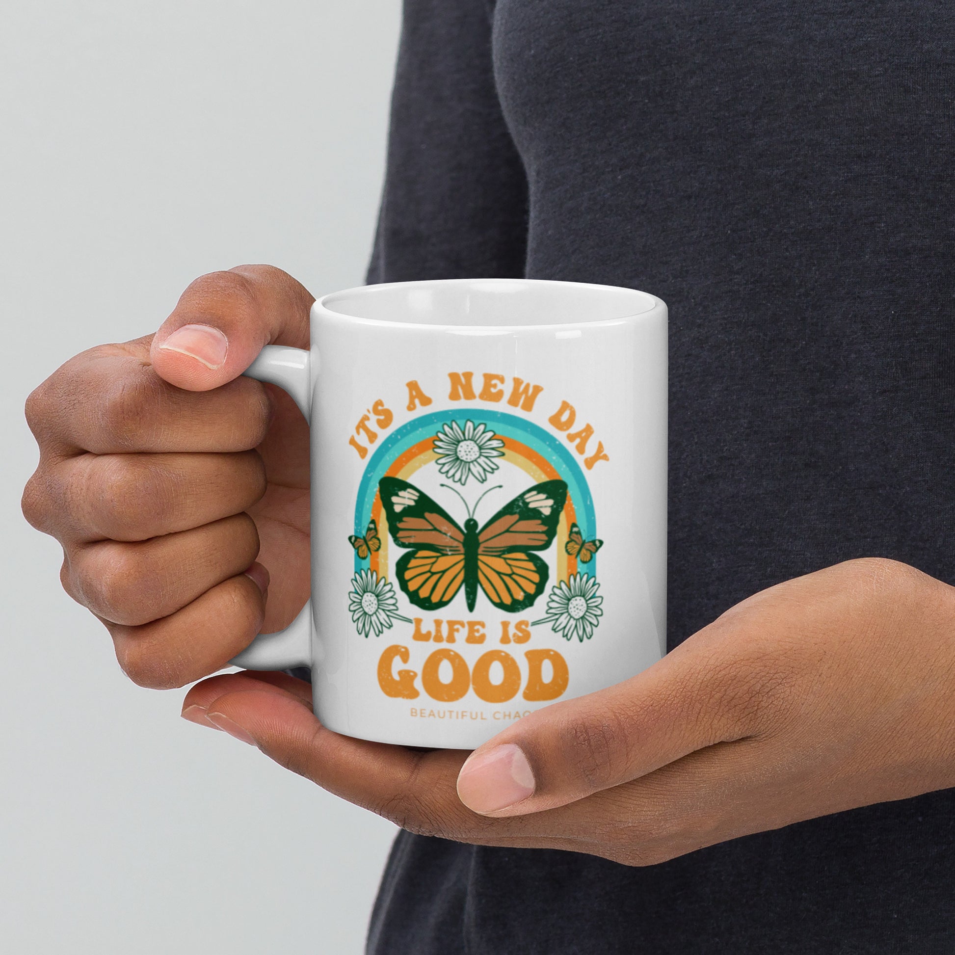 It's a New Day Life is Good Retro Butterfly Mug hands